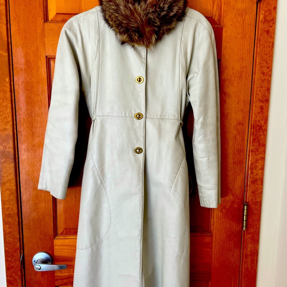 Vintage Saks Fifth Ave white leather trench coat, raccoon collar. AudreyHepburn